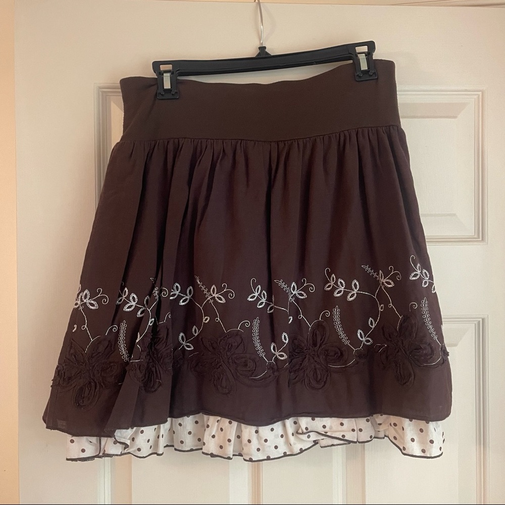 Brown flared skirt with floral details